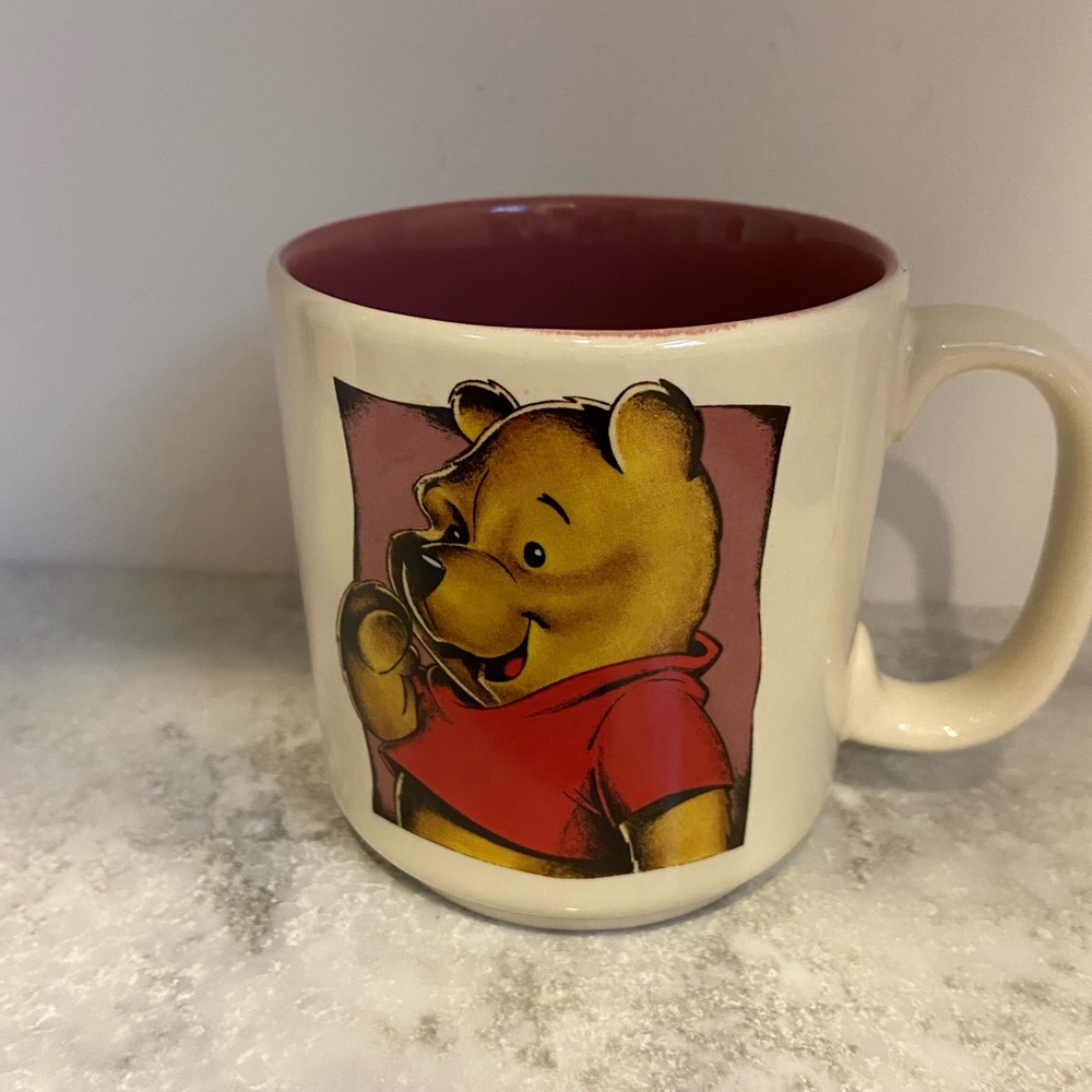 Winnie the Pooh coffee mug.